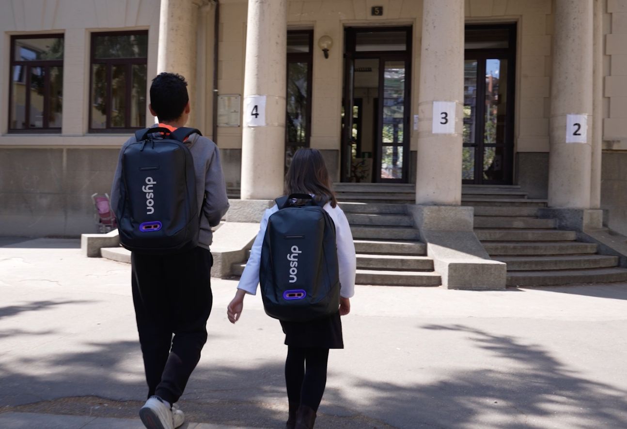 A model get their hair styled.